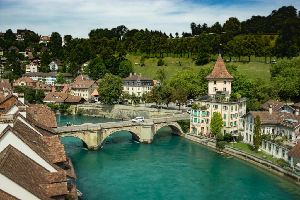 pexels-photo-1291766-1291766 Aerial shot of Untertorbrücke bridge over the Aare River in Bern, Switzerland, with historic buildings.