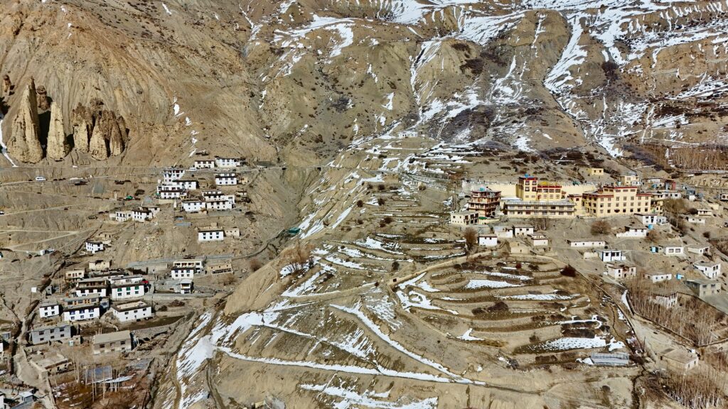 pexels-photo-20883702-20883702 Aerial view of a scenic village in Spiti Valley, Himachal Pradesh, India, showcasing terraced landscapes and traditional architecture.