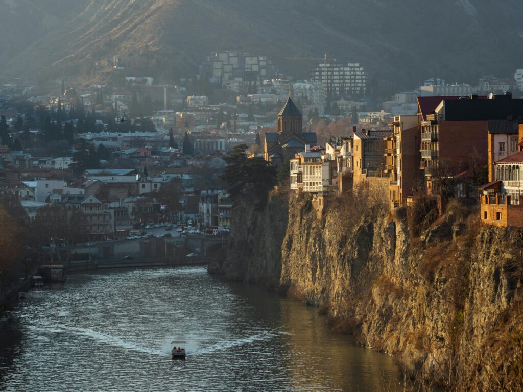 pexels-photo-30283829-30283829 A stunning view of Tbilisi with the historic Mtkvari River and iconic architecture.