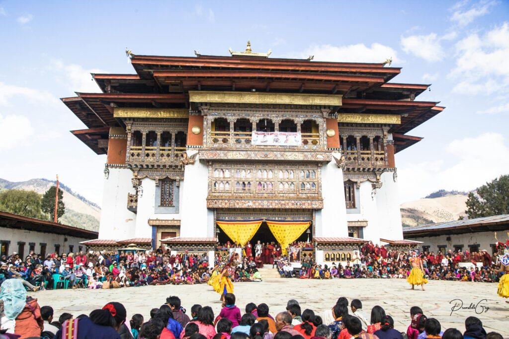pexels-photo-5011717-5011717 Vibrant celebration at Punakha Dzong, showcasing Bhutanese culture and architecture.