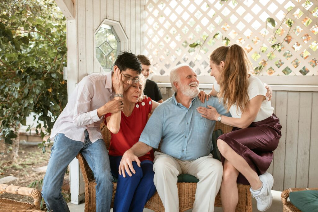 Cheerful family spending quality time together outdoors, showcasing love and connection.