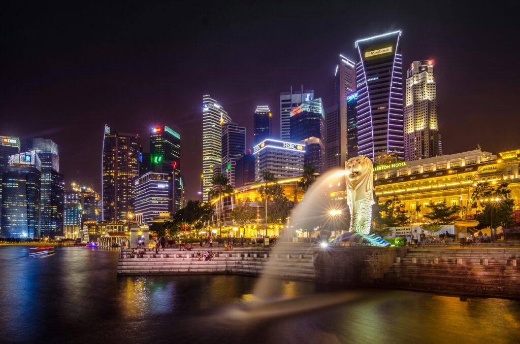 pexels-photo-777059-777059 Dazzling view of the Singapore cityscape with Merlion and illuminated skyscrapers at night.