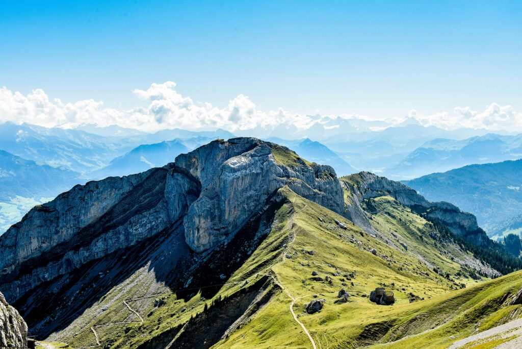 pexels-photo-9512997-9512997 Breathtaking aerial view of Mount Pilatus showcasing its rugged peaks and scenic trails in Switzerland.