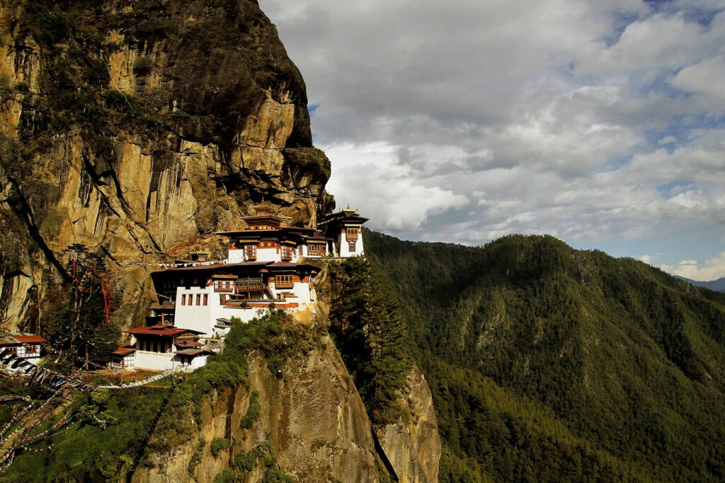 the-tiger-s-nest-monastery-taktsang-palphug-monastery-buddha-67548-67548 Majestic Taktsang Monastery nestled on steep cliffs in Bhutan, offering stunning natural views.